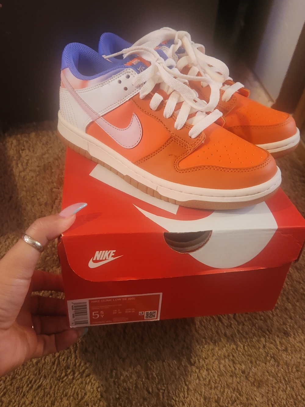 Nike Orange Low-Top Sneakers with Purple Accent
